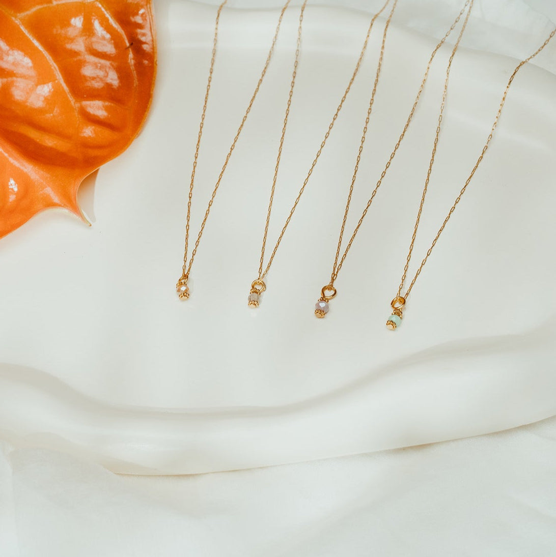 THE FILIGREE - GRÜNE GLASPERLE/GOLD