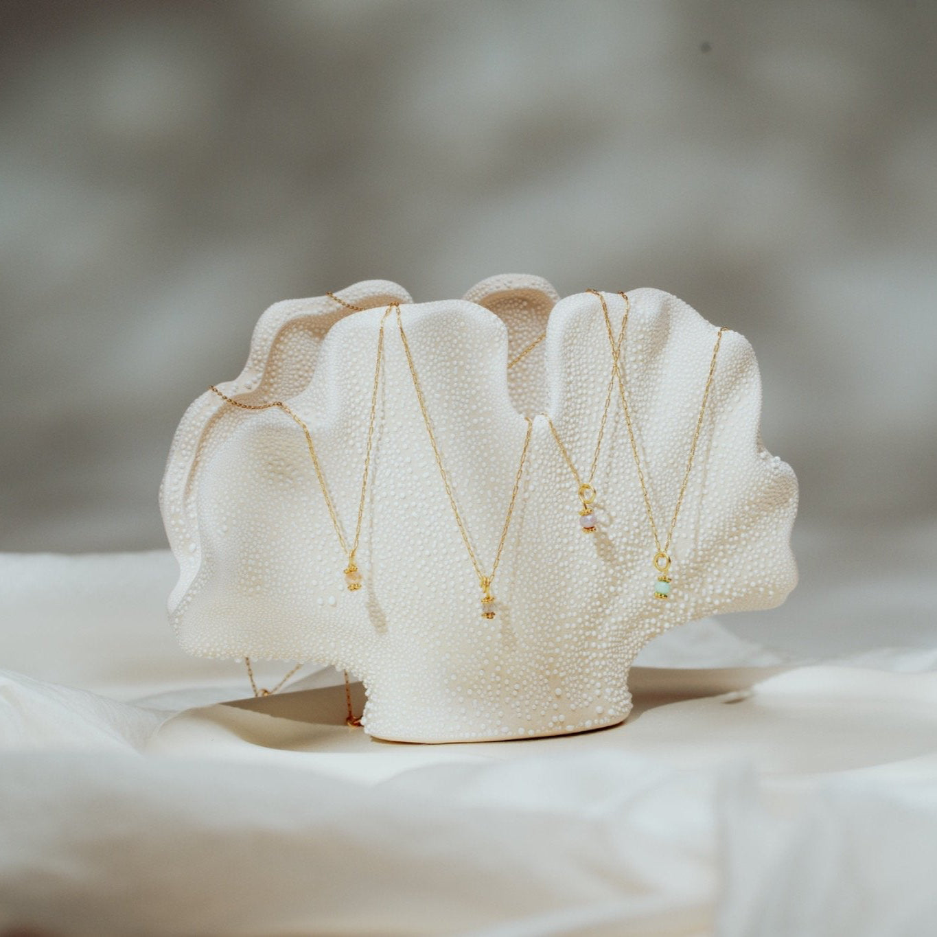 THE FILIGREE - GRÜNE GLASPERLE/GOLD